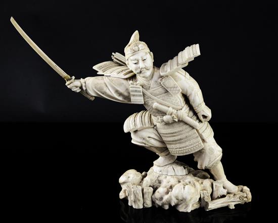 A Japanese sectional ivory figure of a Samurai warrior, early 20th century, height 20cm, slight losses